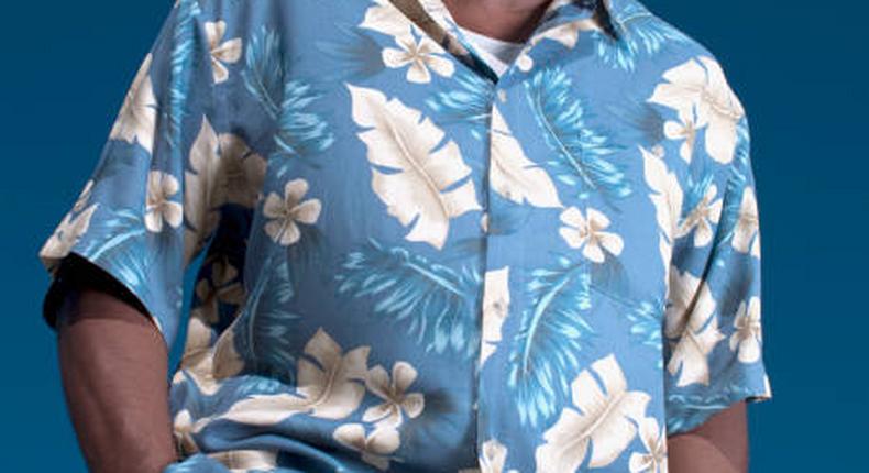 A man in a flowery pattern shirt