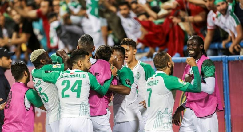 Raja's players celebrate victory