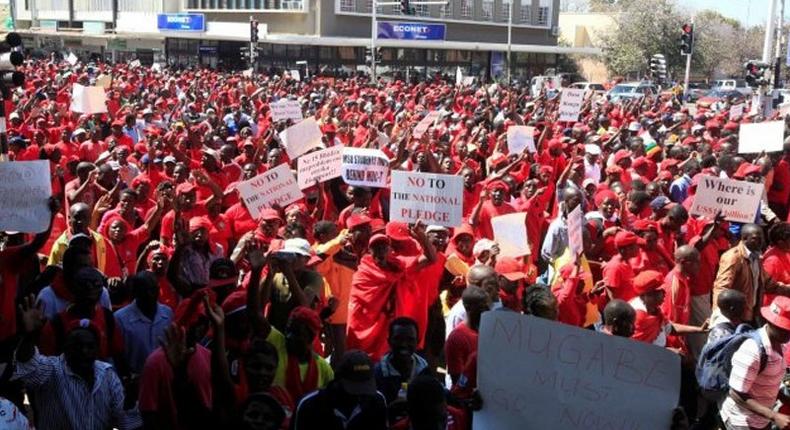 Zimbabwean police fire tear gas, water cannon to disperse protest