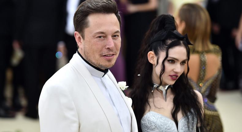 Elon Musk and Grimes, seen at the 2018 Met Gala, had a tumultuous relationship, according to a new book called Character Limit, which also details Musk's chaotic purchase of Twitter.Theo Wargo/Getty Images