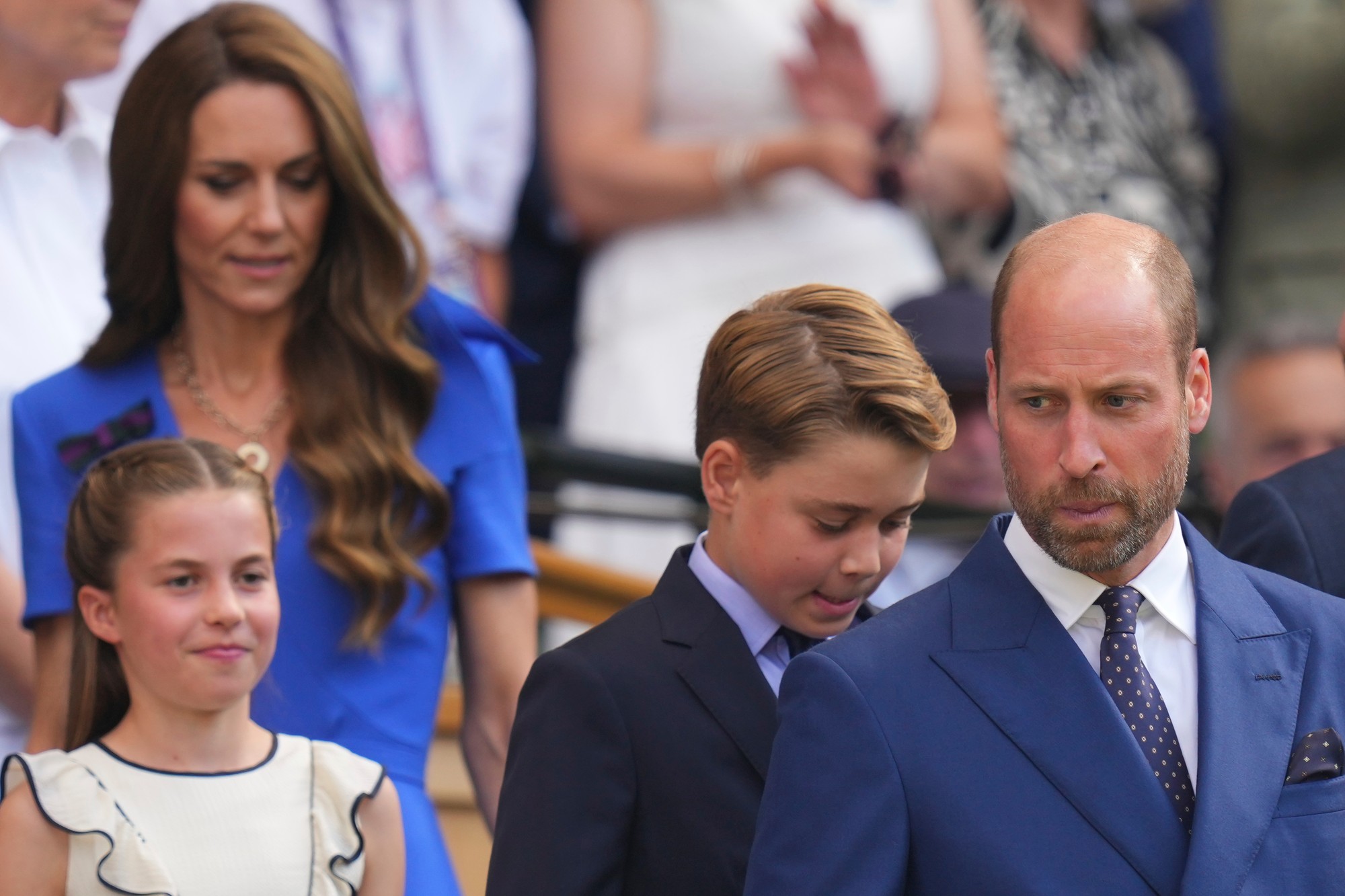 Britský princ William, princezná z Walesu Kate, princ George a princezná Charlotte na tenisovom šampionáte vo Wimbledone v Londýne.