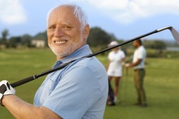 Portrait of mature male golfer