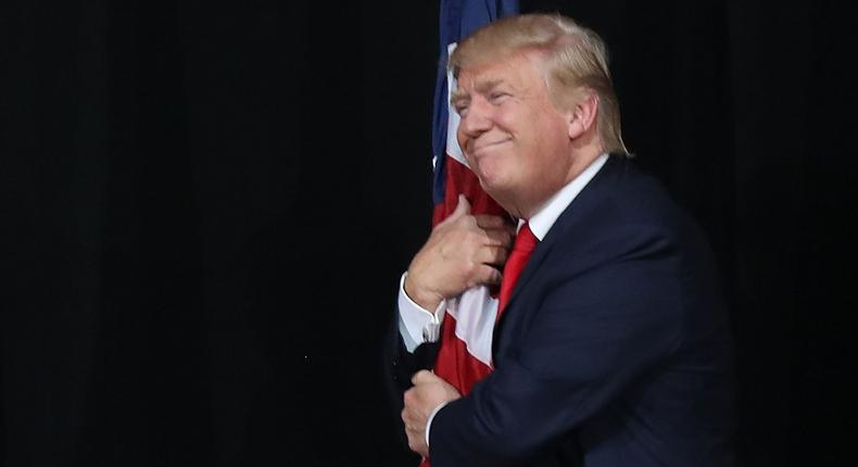 Donald Trump american flag hugging