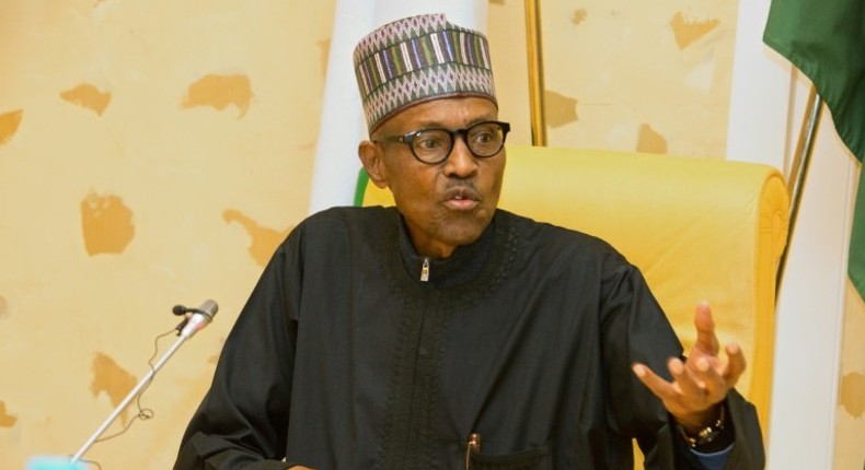 Nigerian President Muhammadu Buhari addresses members of his cabinet in March after returning from London where he underwent treatment for nearly two months for an undisclosed ailment