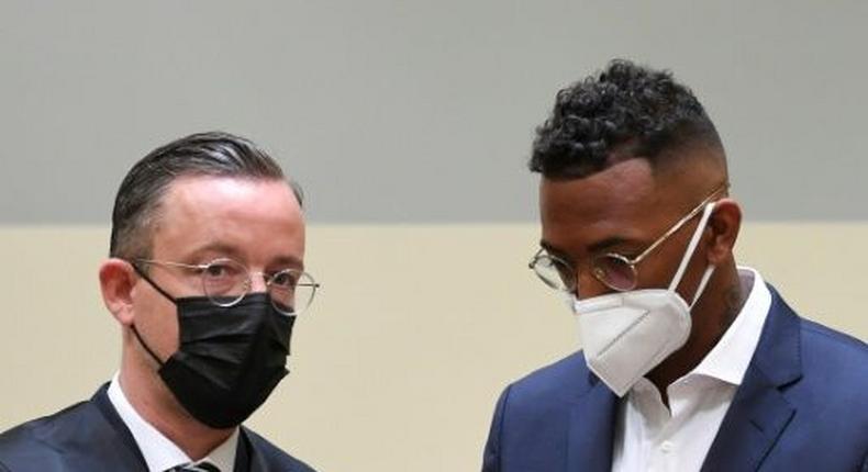 Former Bayern Munich defender Jerome Boateng (R) and his lawyer Kai Walden in court in Munich Creator: Christof STACHE