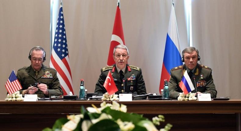 Chief of the General Staff of the Turkish Armed Forces, Hulusi Akar (C), US Chariman of the Joint Staff General Joseph Dunford (L) and Russian Chief of General Staff General Valery Gerasimov meet in Antalya