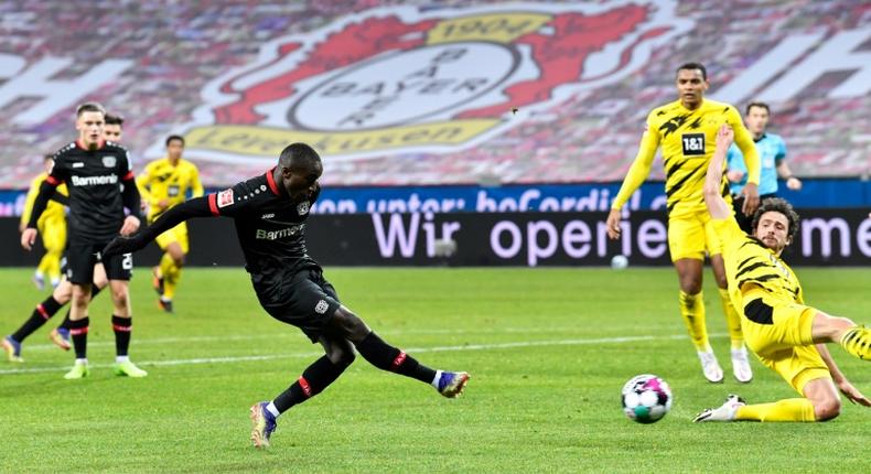 Moussa Diaby fires Bayer Leverkusen ahead against Borussia Dortmund on Tuesday