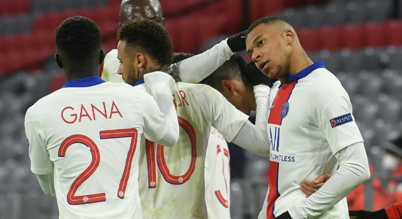 Kylian Mbappe (R) celebrates with his Paris Saint-Germain team-mates after scoring his second goal against Bayern Munich on Wednesday