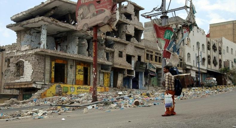 Heavily damaged buildings in Taez