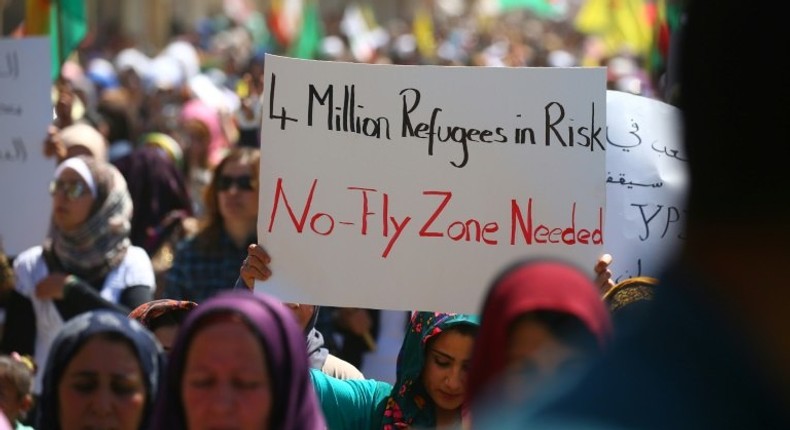 Kurdish protesters demand a no-fly zone in northern Syria on April 26, 2017, a day after after deadly Turkish air strikes