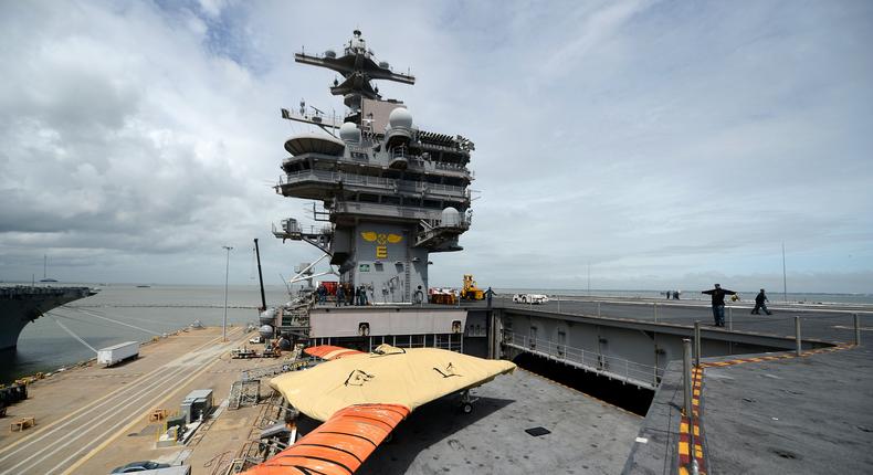 Northrop Grumman’s X-47B is loaded Monday onboard the USS George H.W. Bush (CVN-77) for a planned May, 14 2013 catapult launch.