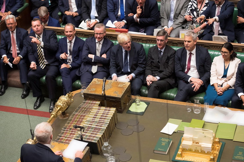 Britain's Prime Minister Boris Johnson, Chancellor of the Duchy of Lancaster Michael Gove, and leade