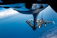 July 28, 2022, Adriatic Sea, Italy: A U.S. Air Force F-16 Fighting Falcon fighter jet, assigned to the 31st Fighter Wing, approaches a KC-135 Stratotanker