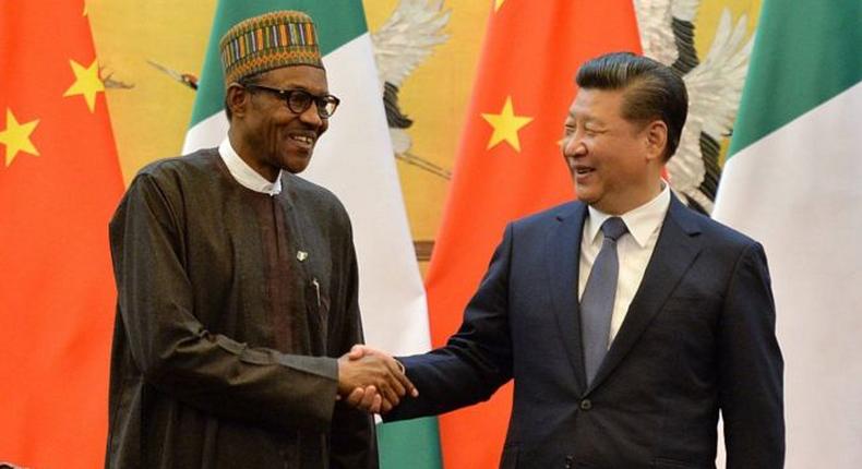 President of the Federal Republic of Nigeria, Muhammadu Buhari (L) and Chinese President Xi Jinping