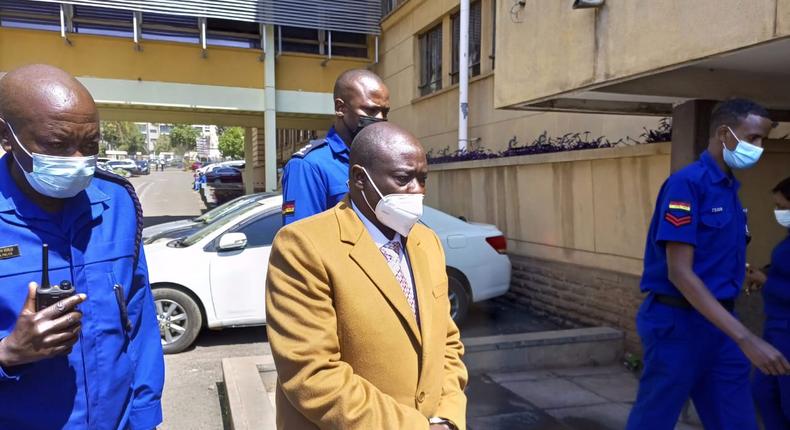 Mathira MP Rigathi Gachagua accompanied by police officers during his arraignment on Monday July 26th, 2021 