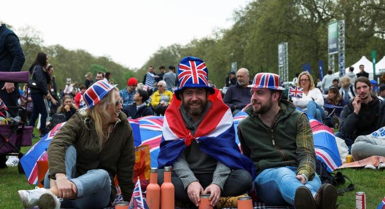 Sophie Smith, Oliver Smith, and Scott Vallely from Winchester sit at Hyde Park on the day of Britain’s King Charles’ coronation ceremony, in London, Britain May 6, 2023. REUTERS/Emilie Madi.