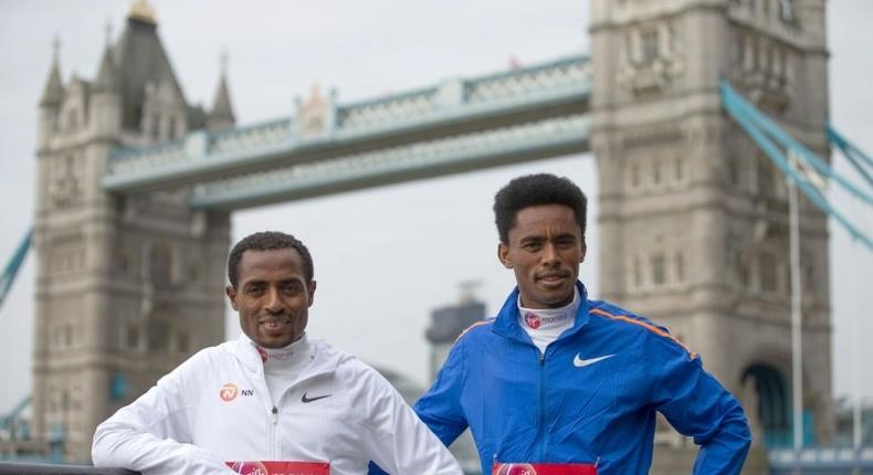 Ethiopian elite runners, Kenenisa Bekele (L) and Feyisa Lilesa pose during a photocall ahead of the London Marathon, Bekele is hoping to set a new record time