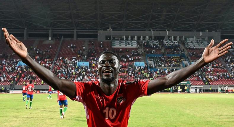 Gambia star Musa Barrow celebrates a victory over Tunisia on Thursday in an Africa Cup of Nations Group F match in Limbe. Creator: Issouf SANOGO