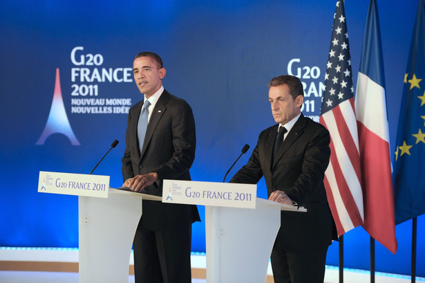 Prezydent USA Barack Obamia i prezydent Francji Nocolas Sarkozy na szczycie G20 w Cannes. fot. EPA/LIONEL BONAVENTURE