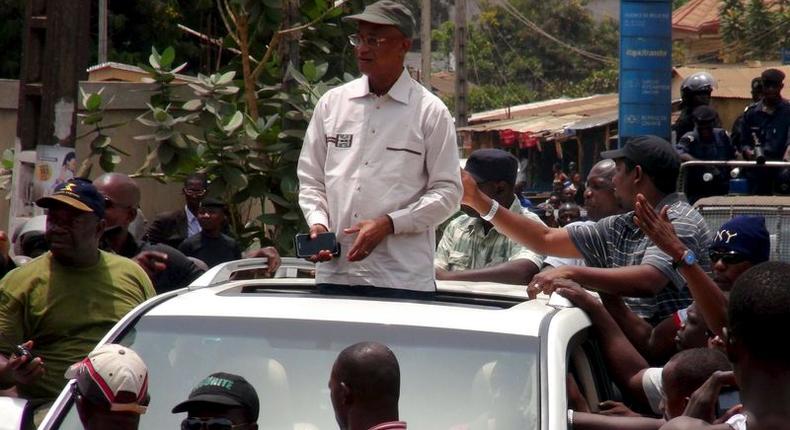 Guinea opposition leader Cellou Dalein Diallo attends a rally in Conakry April 20, 2015. The rally was called by the opposition parties to pressure authorities to hold local elections before a planned presidential vote, as laid out in a 2013 agreement between Guinea's rival political factions. REUTERS/Saliou Samb