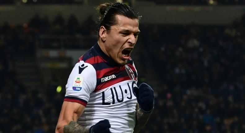 Bologna striker Federico Santander, pictured here celebratig a goal at Inter Milan, snatched a win against Napoli on Saturday