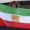FIFA je zastave iz perioda pre revolucije zabranila na stadionima, ali neke su se provukle na stadion za utakmicu protiv Novog Zelanda | Foto: AFP via Getty Images