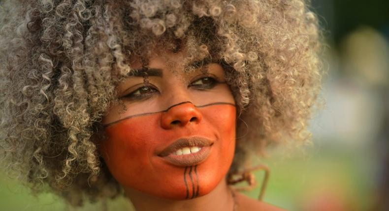 An indigenous woman participates in protests outside the National Congress building in Brasilia, Brazil, on April 24, 2019