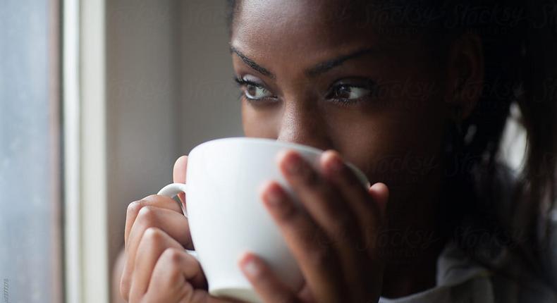 Black woman drinking tea [Stocksy]