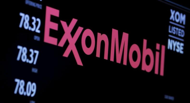 The logo of Exxon Mobil Corporation is shown on a monitor above the floor of the New York Stock Exchange in New York, December 30, 2015. 