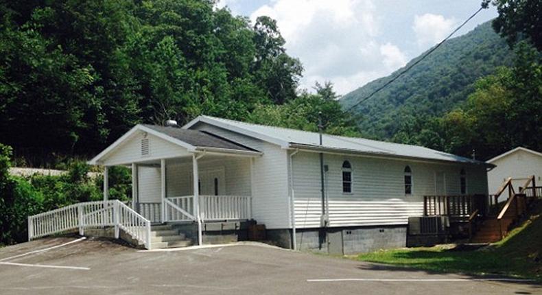 John David Brock, 60, of Stoney Fork, was handling the snake during a Sunday service at the Mossy Simpson Pentecostal church in Jenson, Kentucky (pictured), when it bit him