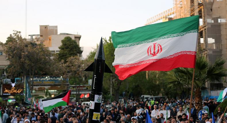 A group gather in Palestine Square in the Iranian capital Tehran, staging a demonstration to support Iran's drone and missile attacks on Israel, on April 15, 2024.Fatemeh Bahrami/Anadolu via Getty Images
