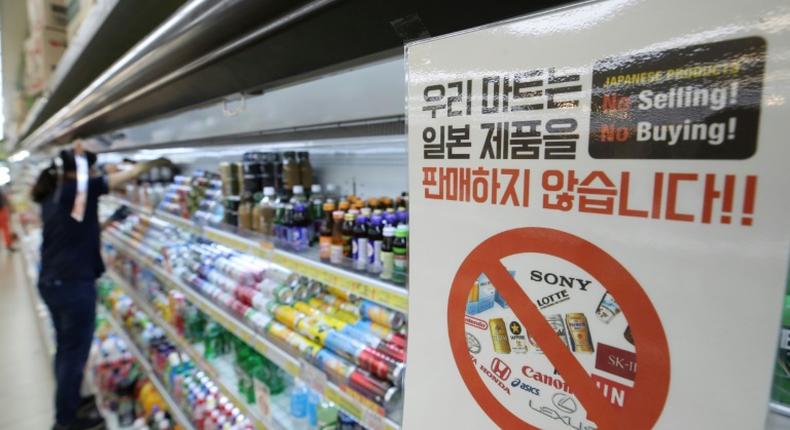 A shop sign in Seoul informs customers that it will not sell products from Japan, as a trade dispute between the US allies worsens