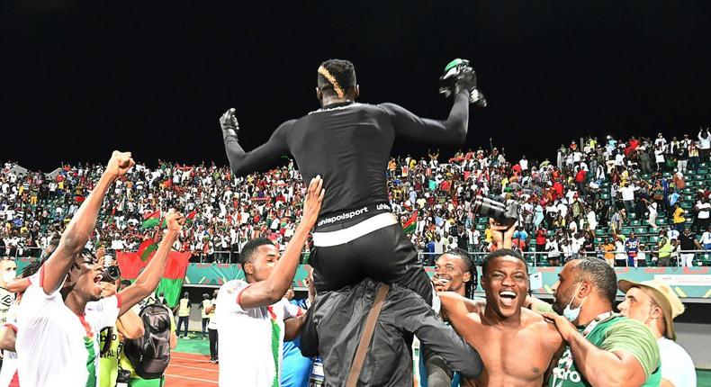 Burkina Faso goalkeeper Herve Koffi is hoisted high during his team's victory celebrations Creator: Issouf SANOGO