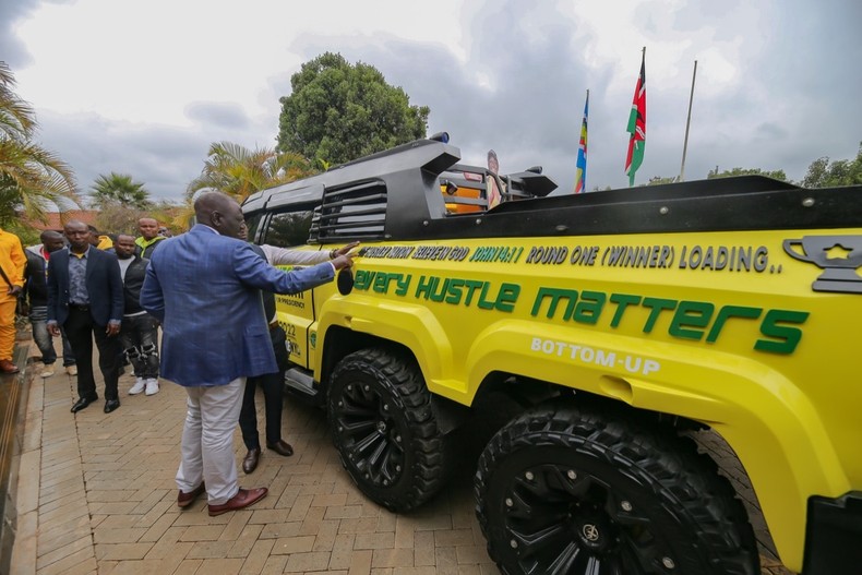 William Ruto receiving the customized track in his Karen residence