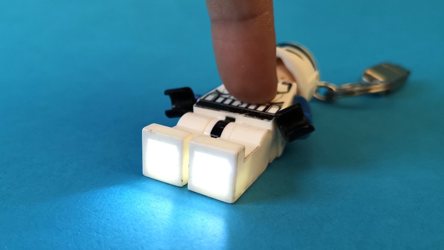 Flashlights are always handy.  Here is a model from Lego Star Wars.