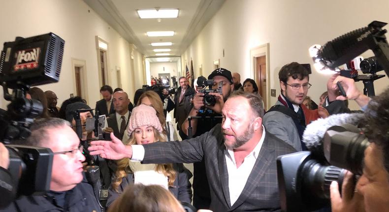 Alex Jones in the hallway outside the Google hearing.