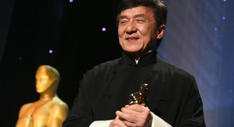 Jackie Chan poses with his Honorary Oscar Award during the 8th Annual Governors Awards in Hollywood, California