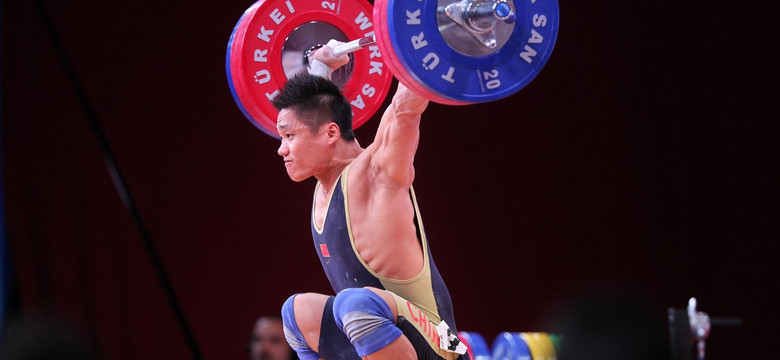 Trzykrotny mistrz olimpijski w podnoszeniu ciężarów Lyu Xiaojun na dopingu
