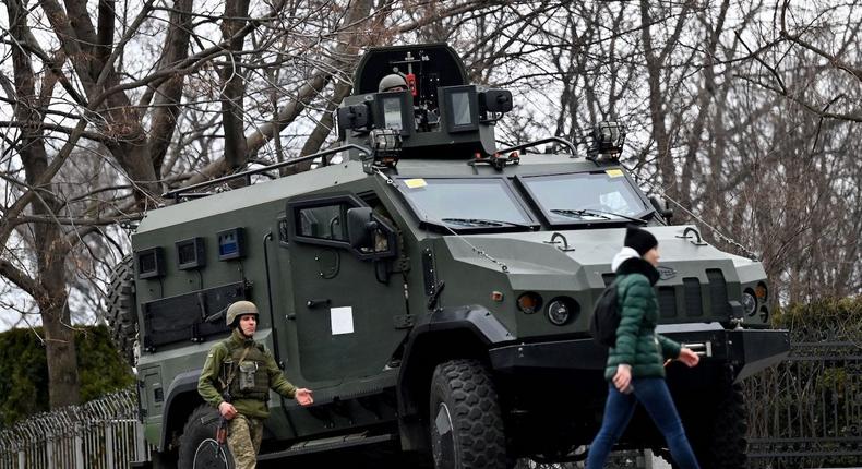 Ukrainian Military Forces servicemen block a road in Kyiv, Ukraine, on February 24, 2022.
