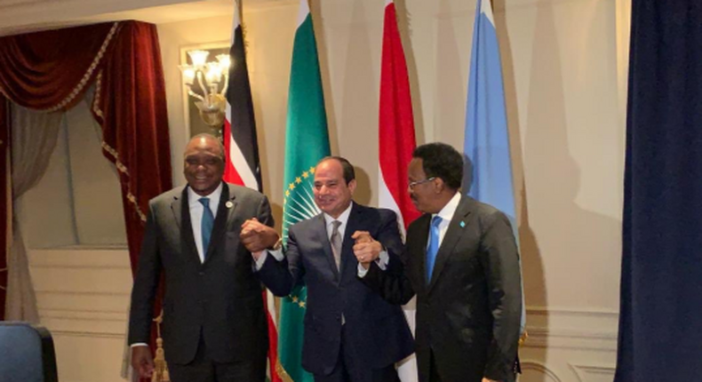 Egypt’s President Abdelfattah al-Sisi (M) with Kenyan President Uhuru Kenyatta (L)  and Somalian President Mohamed Farmaajo (R).  