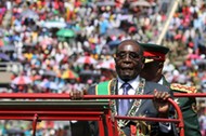 Zimbabwe's President Mugabe arrives to address Zimbabwe's Independence Day celebrations in Harare