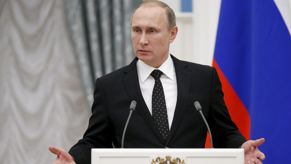 Russia's President Vladimir Putin speaks during a news conference after a meeting with his French co