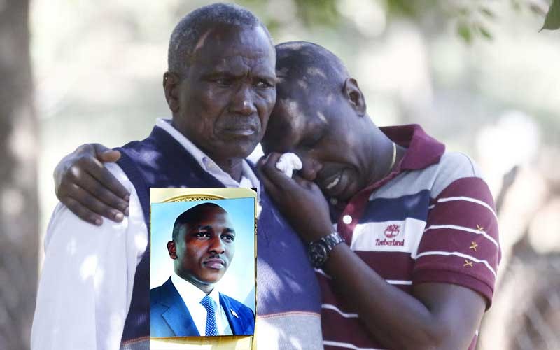 Kipyegon Kenei's father, John Chesang with a relative in Nakuru