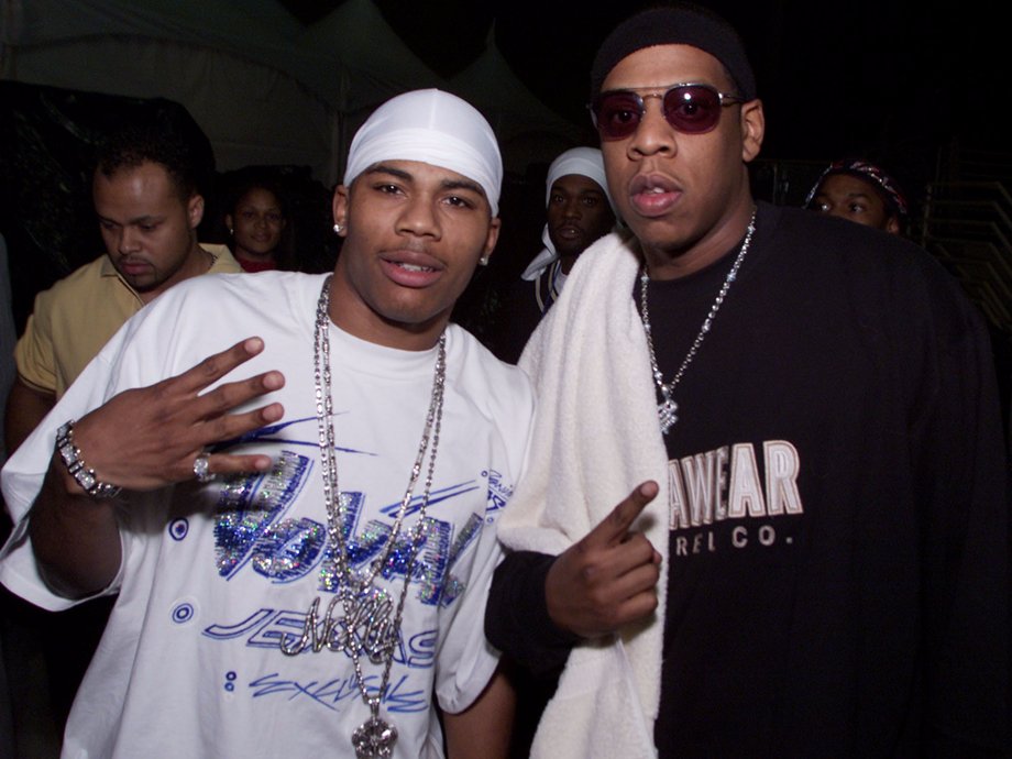 Jay-Z sporting a Rocawear shirt next to rapper Nelly in 2000.