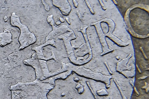 File photograph of detail of a European map, including Great Britain, on the face of a Euro coin 