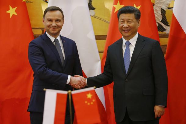 Polands President Andrzej Duda and his Chinese counterpart Xi Jinping shake hands after a signing ce