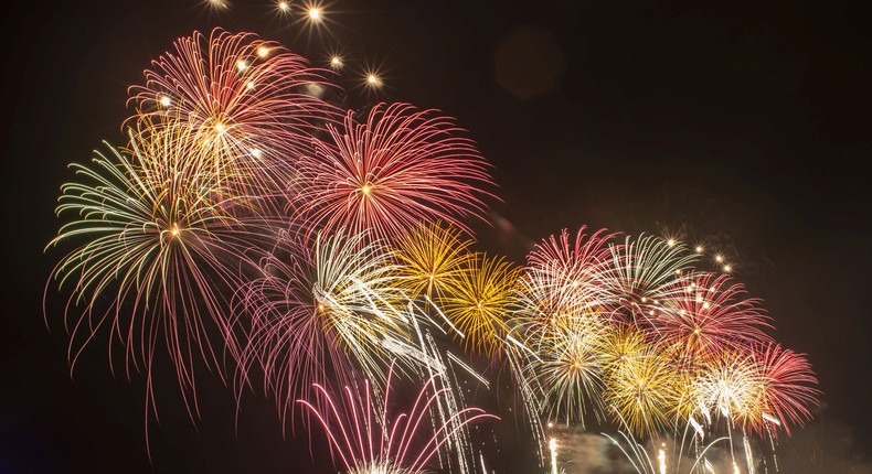 Fireworks explode over the Lagoon Beach Ancol during New Year's Eve celebrations in Jakarta