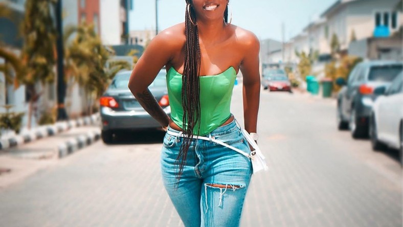 Tiwa Savage rocks street style in ripped denim [Instagram/ Tiwa Savage]