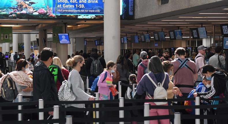 Frontier Airlines CEO Barry Biffle said people are still booking flights ahead of the holiday season.