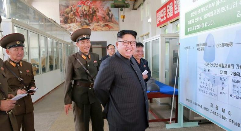 This undated picture released by North Korea's official Korean Central News Agency shows leader Kim Jong-Un visiting the Chemical Material Institute of the Academy of Defense Science